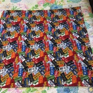 Colorful license plate lap blanket or wall hanging.  41 inches square.